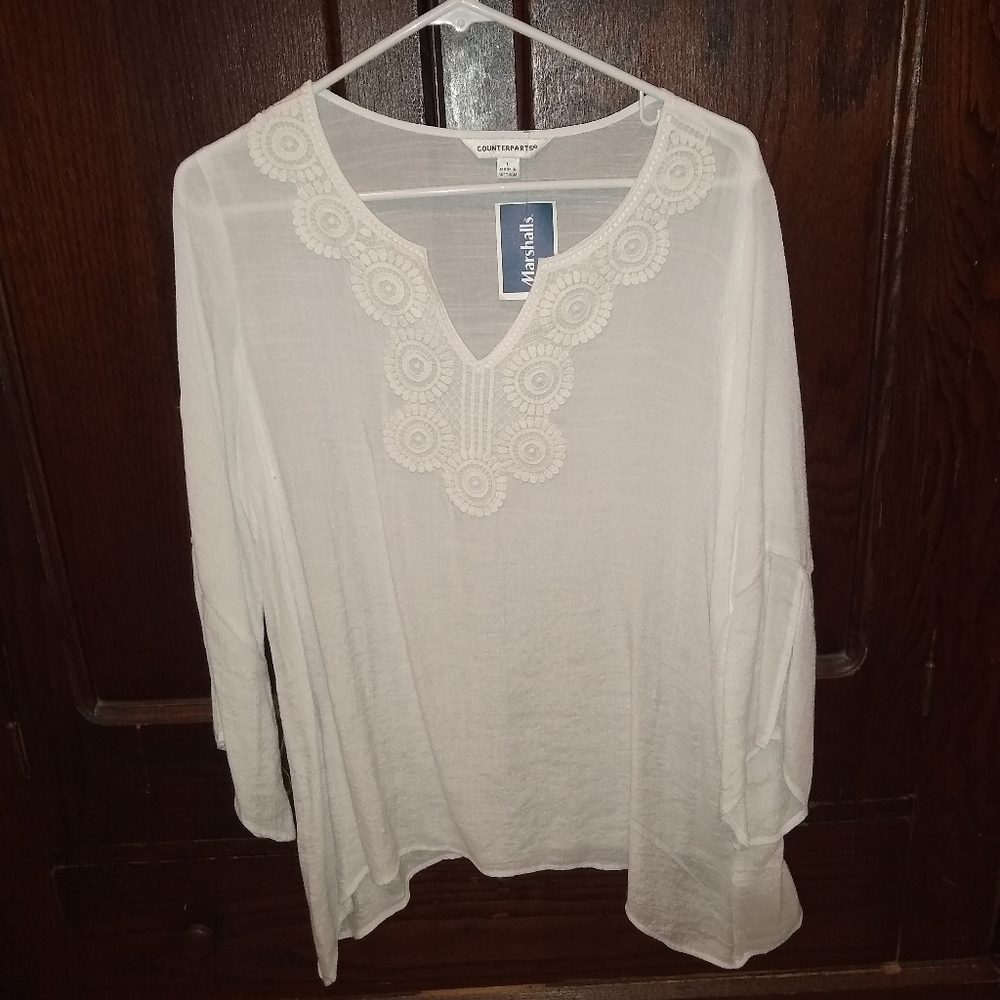 Sheer top with embroidered design size L